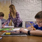 Lyndsey Medsker, a single mom working from home with her  two boys, 9 and 10, on March 24 in Washington, DC.